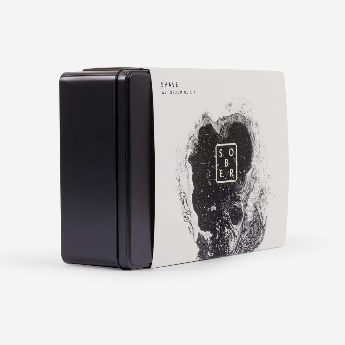 Zwart metalen doosje met wit label en abstract zwart-wit ontwerp, Shave Wet Grooming Kit