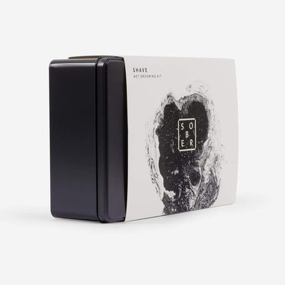 Zwart metalen doosje met wit label en abstract zwart-wit ontwerp, Shave Wet Grooming Kit